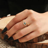 Salve ‘Blue’ Evil Eye Gold-Toned Open Adjustable Ring