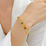 Salve Gold-Toned Studded Love Band Bracelet