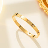 Salve Gold-Toned Studded Love Band Bracelet
