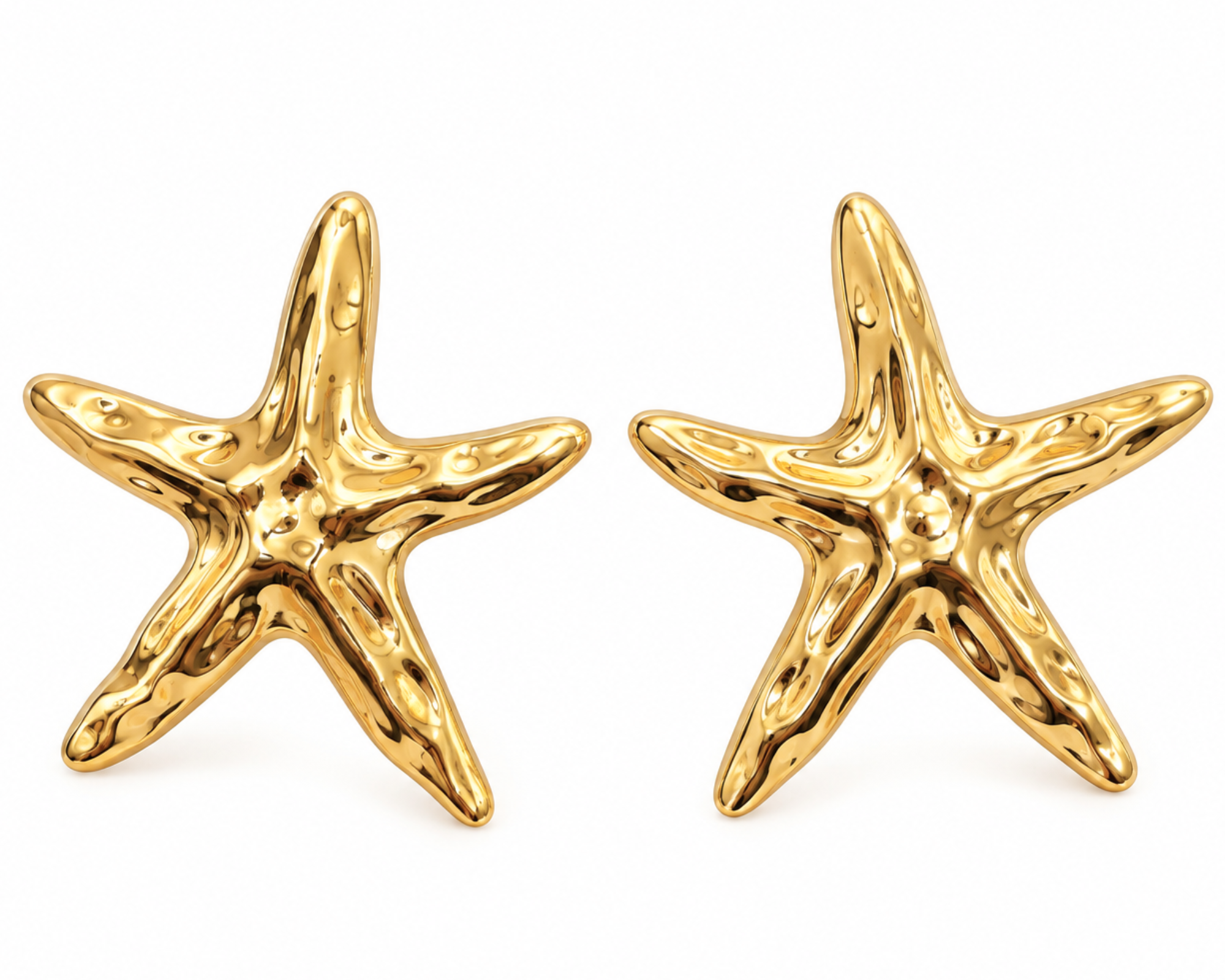 Gold starfish earrings by SALVE featuring a statement design with intricate ocean-inspired details.