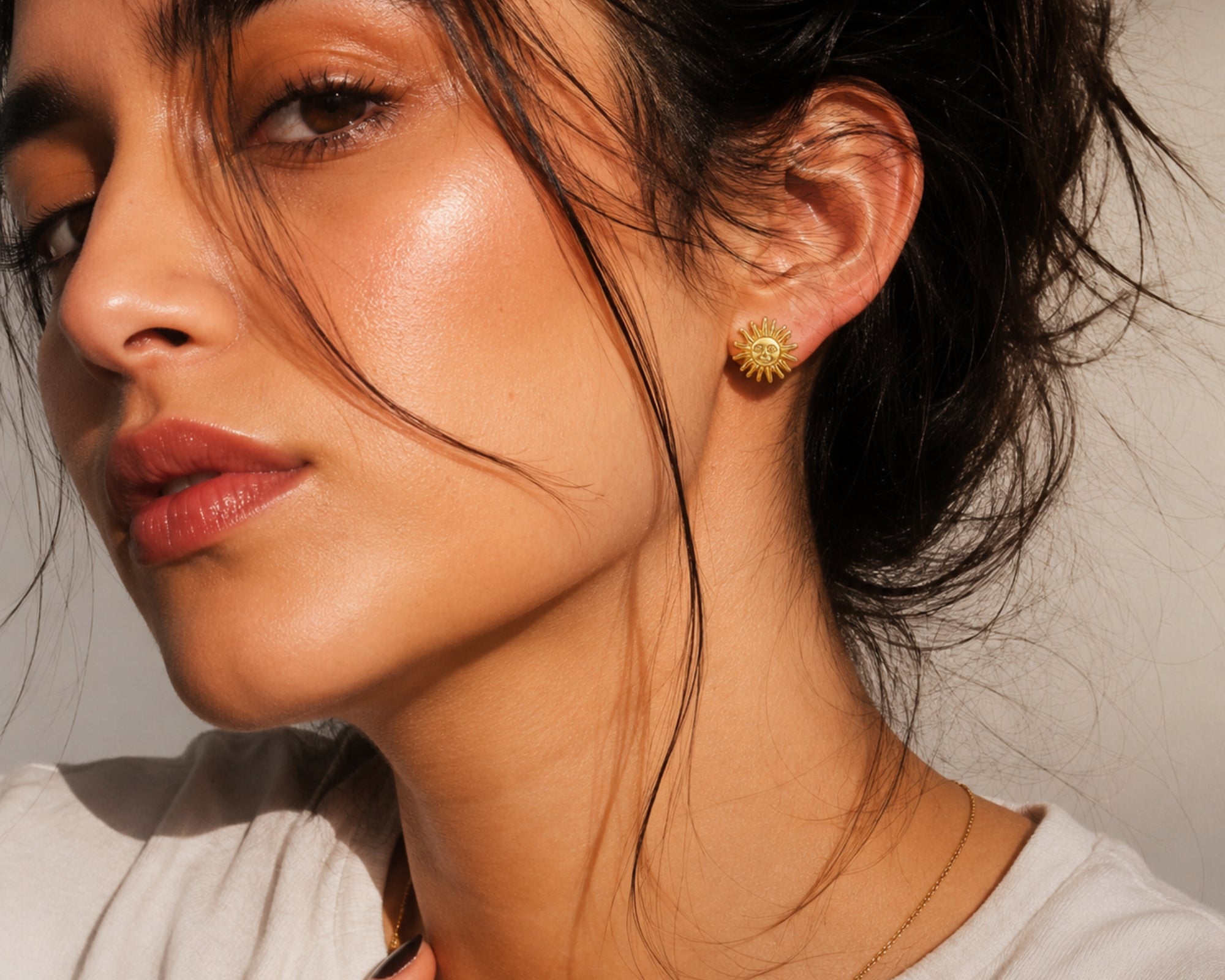 SALVE anti-tarnish sun earrings featuring gold-tone sunburst design, lightweight and stylish jewelry for everyday wear.