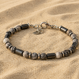 Beaded stone men's hand bracelet from SALVE with natural stone beads and adjustable cord for a stylish, casual accessory.