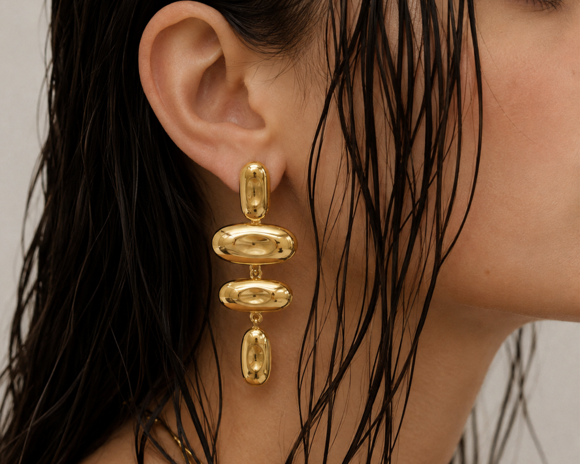 Elegant SALVE contemporary drop earrings with sleek, modern design and smooth metal finish, perfect for stylish accessories.