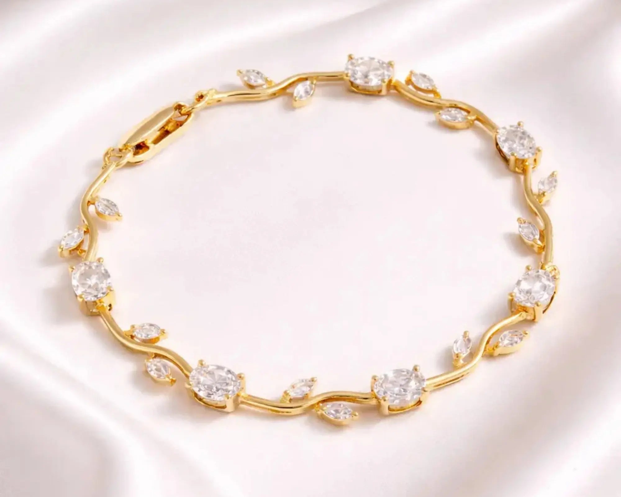 Salve Gold White Tulip bracelet for women featuring a gold-tone bracelet with white tulip charms, elegant and stylish jewelry accessory.