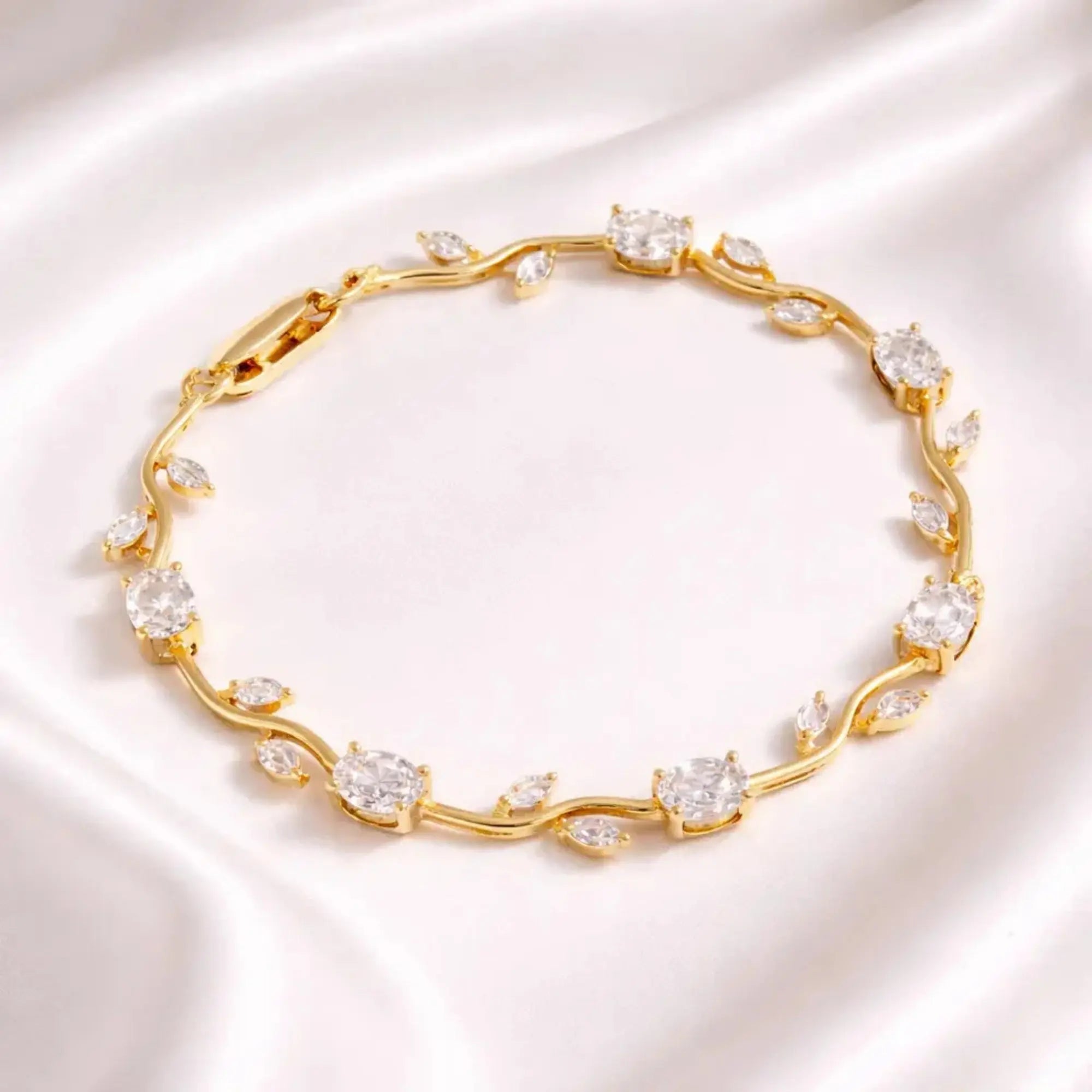 Salve Gold White Tulip bracelet for women featuring a gold-tone bracelet with white tulip charms, elegant and stylish jewelry accessory.