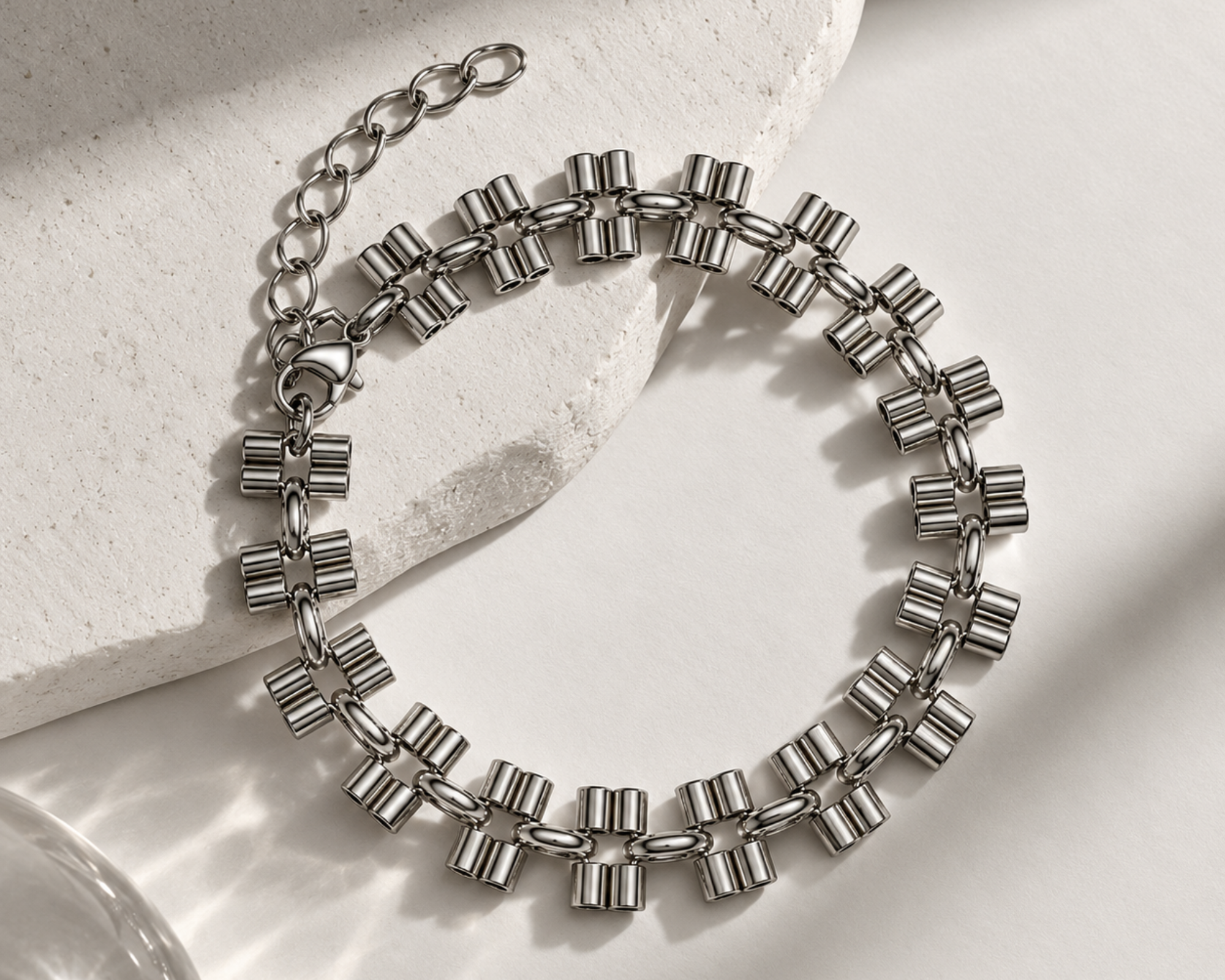 Silver-toned men's bracelet from SALVE featuring a sleek, modern design with smooth metal links.