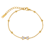 Gold-toned SALVE bow bracelet with elegant design, featuring a delicate bow charm on a sleek bracelet chain.