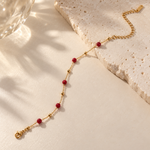 Salve red crystal anti-tarnish bracelet featuring vibrant red crystals and a sleek silver-tone chain design.