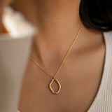 Abstract Gold-toned Pendant Necklace