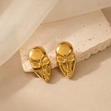 Gold statement face card stud earrings by SALVE featuring bold, modern design with a polished finish.