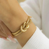 Salve Herringbone Knotted Gold Bracelet