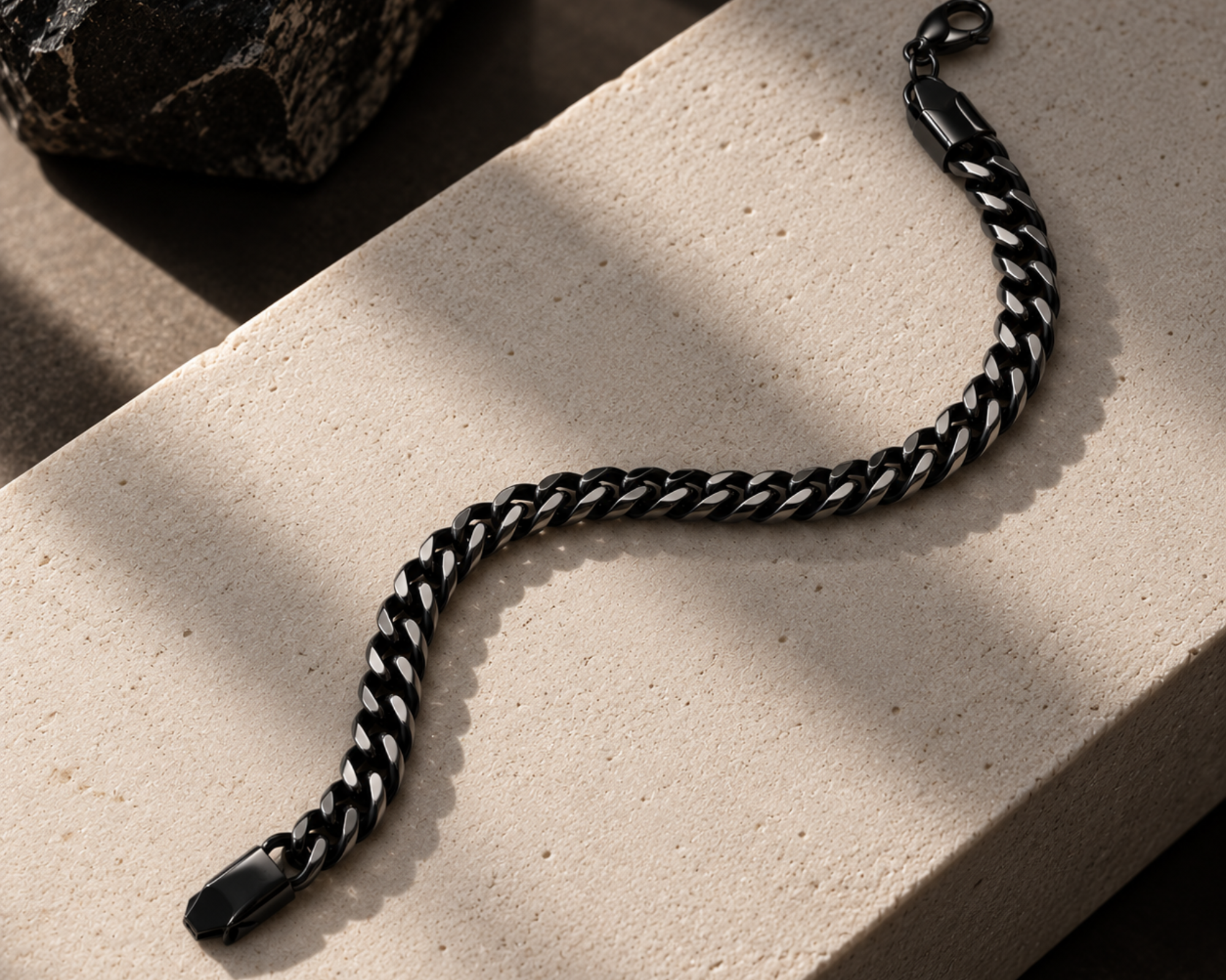 Black and silver wheat chain bracelet for men by SALVE, featuring a sleek, stylish design with interwoven links.