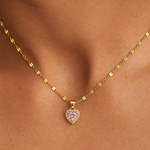 SALVE CZ Baby Pink Heart Pendant Necklace with a sparkling pink heart charm on a delicate chain.