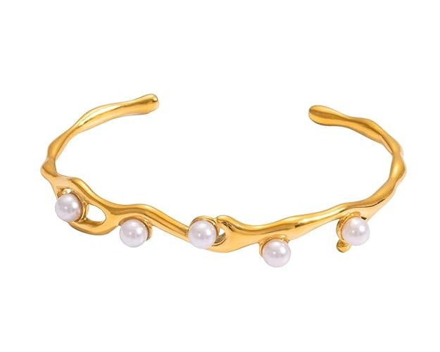 SALVE faux pearl inlaid cuff bracelet featuring a sleek metal design and elegant pearl accents on a neutral background