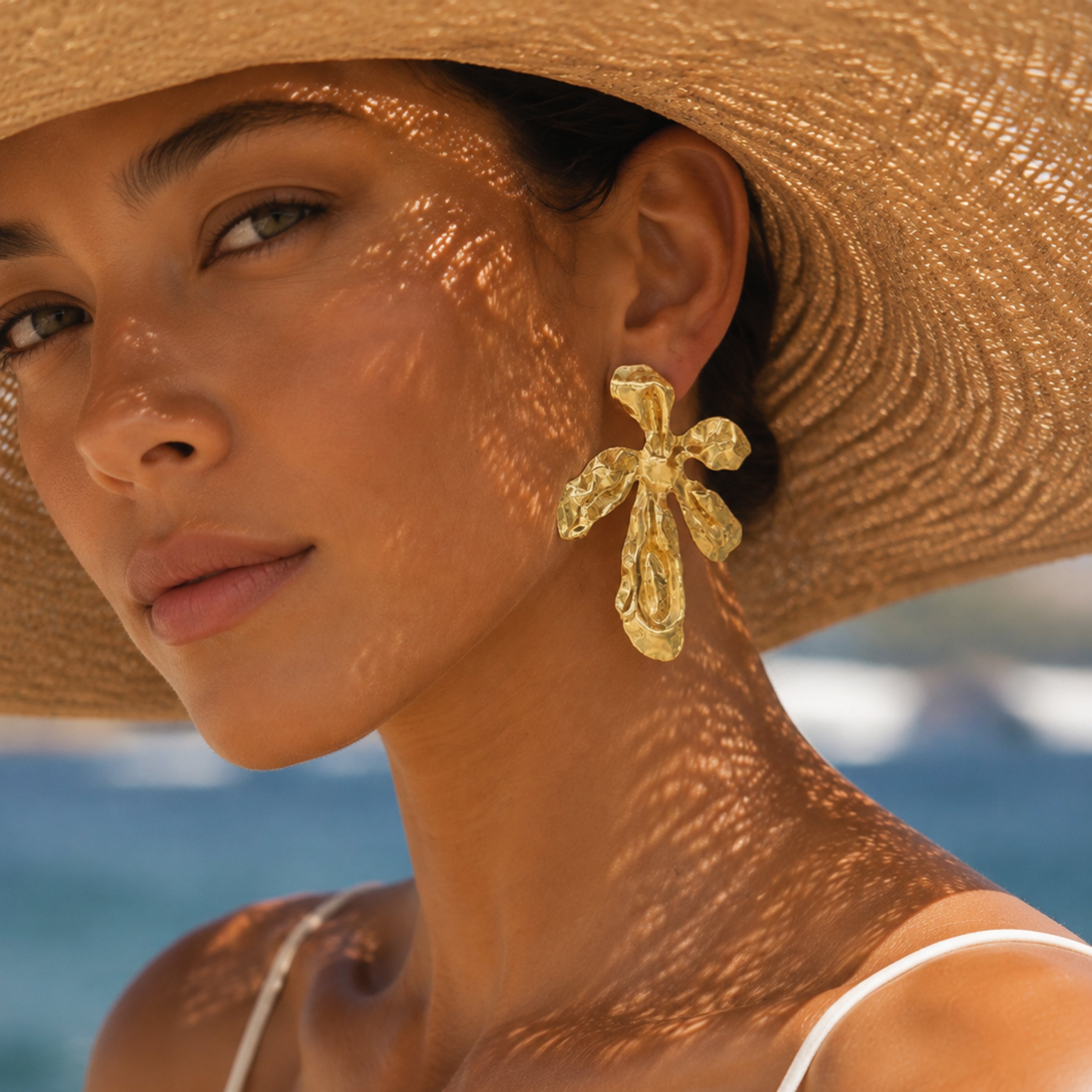 Salve Big Statement Flower Earrings featuring large floral design, gold-tone metal, and bold, eye-catching style for fashion statement.
