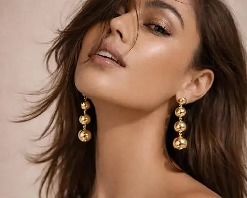 Salve long beaded drop earrings for women featuring colorful beads and gold accents, styled for a fashionable look.
