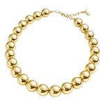 Salve chunky gold beaded aesthetic necklace featuring large gold beads on a stylish chain for a trendy accessories look.