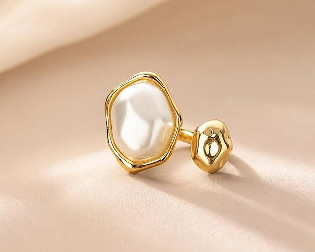 Salve Baroque faux pearl open adjustable ring featuring a large pearl centerpiece and delicate silver band.