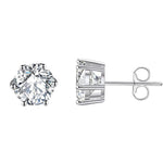 Round cut stainless steel stud earrings by SALVE featuring a sleek, polished design and secure post backing.