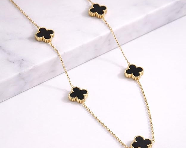 Salve Black Clover gold chain necklace with thick links, showcasing a stylish and bold jewelry piece on a white background.