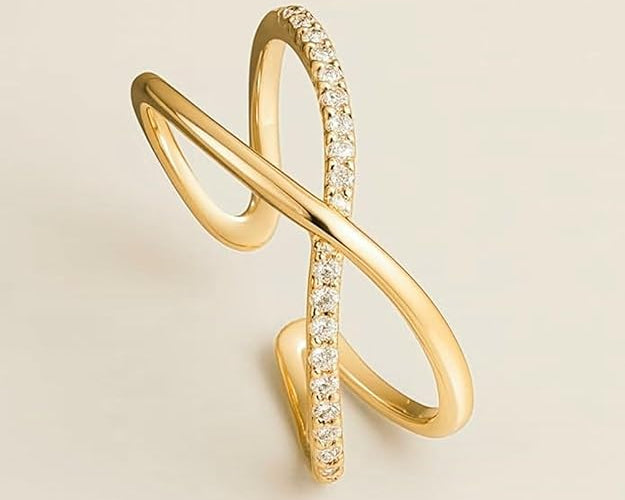 Salve CZ studded cross ring with metallic band, featuring sparkling cubic zirconia accents and a bold religious-inspired design.