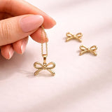 Bow-Mance Stud Earrings & Pendant Set SALVE