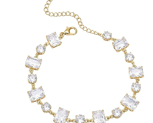 Salve emerald cut and round stone bracelet featuring elegant gemstones and a sleek design on a white background.