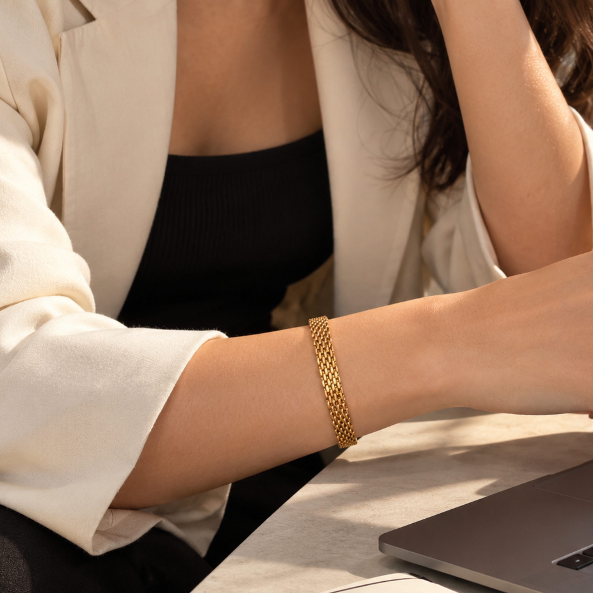 Gold-toned mesh adjustable bracelet from SALVE with sleek, modern design and secure clasp for stylish wear.