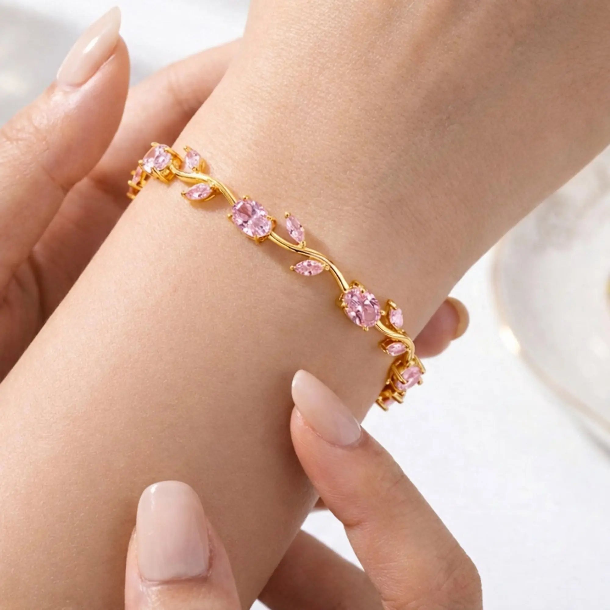 Salve Baby Pink Tulip bracelet for women featuring delicate pink tulip charms on a silver chain.