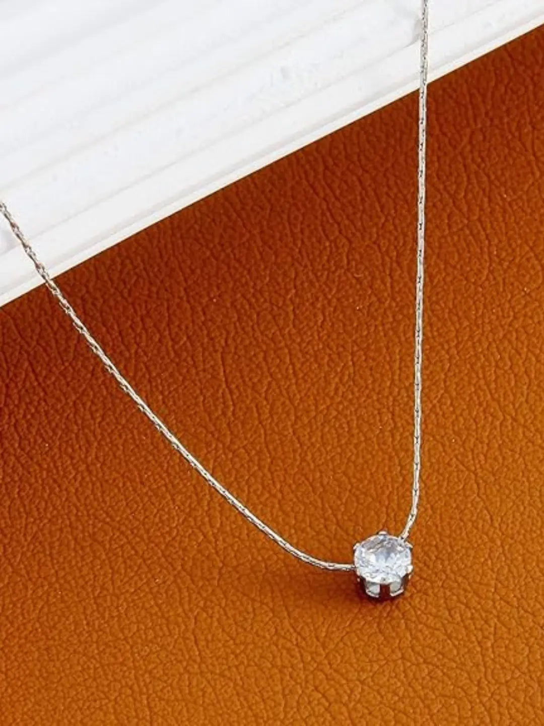 Salve Solitaire stone pendant necklace for women featuring a polished gemstone set in a delicate chain.