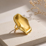 Adjustable SALVE Sculpted Statement Finger Ring with bold, artistic design on a neutral background.