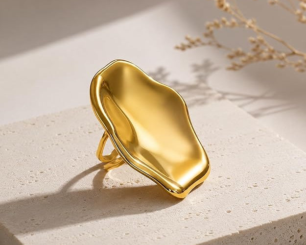 Adjustable SALVE Sculpted Statement Finger Ring with bold, artistic design on a neutral background.