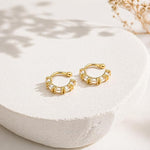 Salve No Piercing CZ Ear Cuffs earrings featuring sparkling cubic zirconia stones and a sleek silver-tone design.