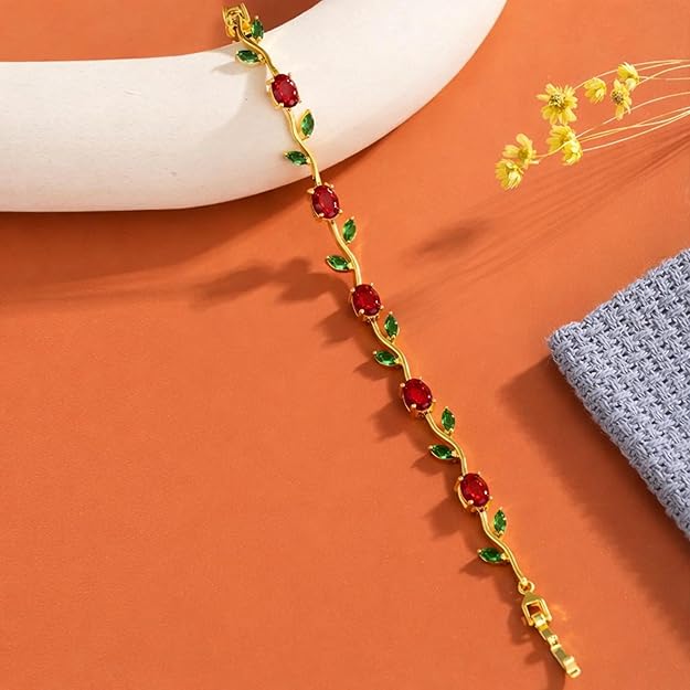 Maroon and green tulip-shaped SALVE bracelet with floral design, featuring intricate metalwork and vibrant colors.