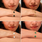 SALVE Anti Tarnish Clover Bracelet Set featuring multiple silver-tone bracelets with delicate clover charms.
