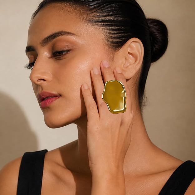 Salve sculpted statement finger ring, adjustable ring with intricate design, showcasing a bold and artistic jewelry piece.
