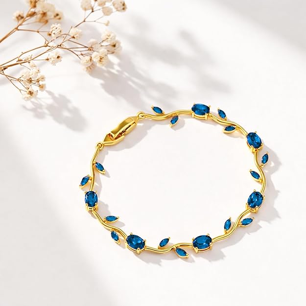 Blue Tulip bracelet by SALVE featuring a delicate floral design with blue tulip charms and silver accents.