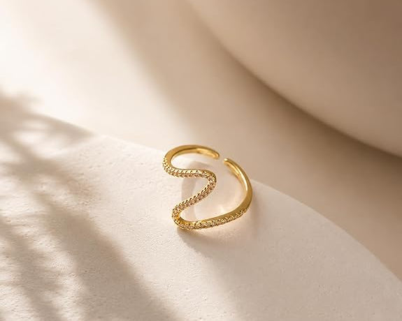 Salve contemporary CZ studded finger ring featuring a sleek band with sparkling cubic zirconia accents.