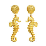 Gold drop earrings featuring sea horse dangles from SALVE, elegant jewelry accessory with intricate sea horse design