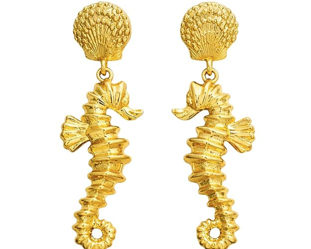 Gold drop earrings featuring sea horse dangles from SALVE, elegant jewelry accessory with intricate sea horse design