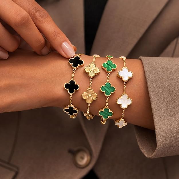 Set of SALVE anti-tarnish clover bracelets with silver-tone finish, featuring four delicate chain bracelets with clover charms.