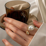 Adjustable SALVE Baroque Faux Pearl open ring featuring a unique pearl design on a sleek metal band.