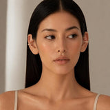 Silver No Piercing CZ ear cuff earrings by SALVE, featuring sparkling cubic zirconia stones and a stylish, modern design.