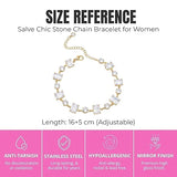 Salve emerald cut and round stone bracelet featuring sparkling green gemstones on a sleek silver band.
