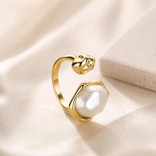 Adjustable SALVE Baroque faux pearl open ring featuring a luminous pearl centerpiece on a sleek metal band.