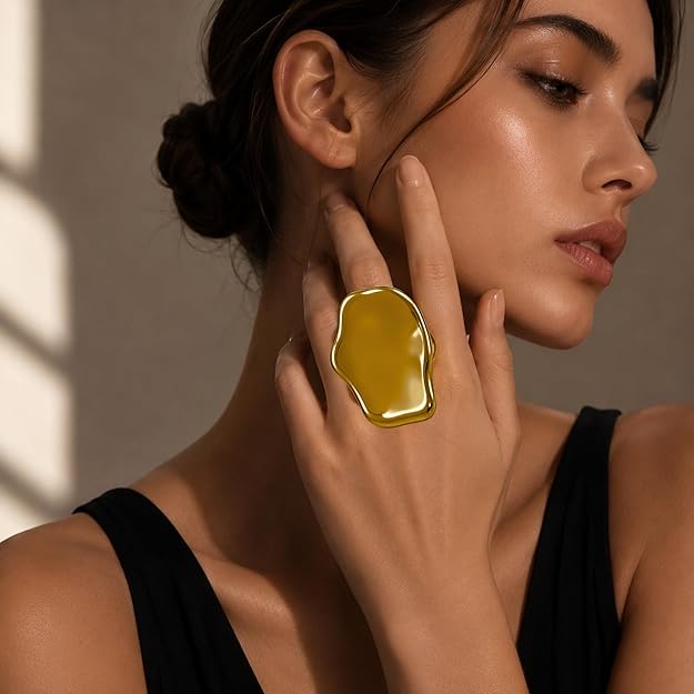 Adjustable SALVE Sculpted Statement Finger Ring with intricate design on a neutral background.