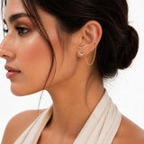 SALVE chic marquise flower ear chain earrings featuring delicate floral design and elegant gold-tone finish.