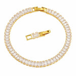 Salve Baguette Stone Tennis Bracelet featuring sparkling rectangular stones and a silver-tone clasp on a delicate bracelet.