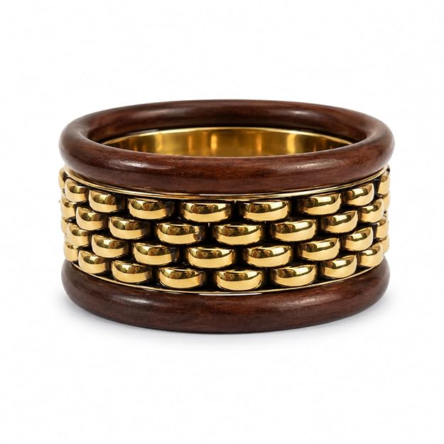 Stack of chunky wooden bangle bracelets from SALVE, featuring natural wood tones and smooth, rounded designs for stylish wristwear.