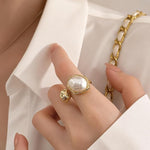 Salve Baroque faux pearl open adjustable ring featuring a stylish pearl design on a silver-tone band.